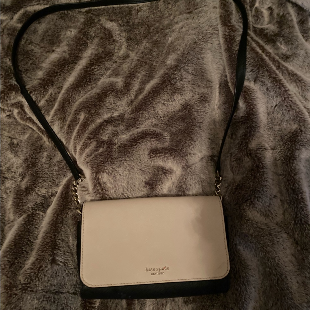 Kate Spade “Staci” small flap crossbody bag.